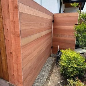 Privacy backyard wood fence with modern design.