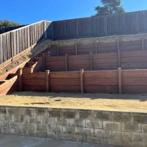 Durable wooden retaining walls enhancing landscape safety and aesthetics.