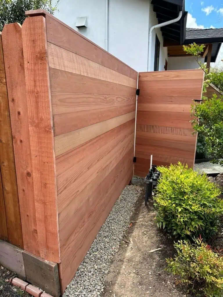 Privacy backyard wood fence with modern design.